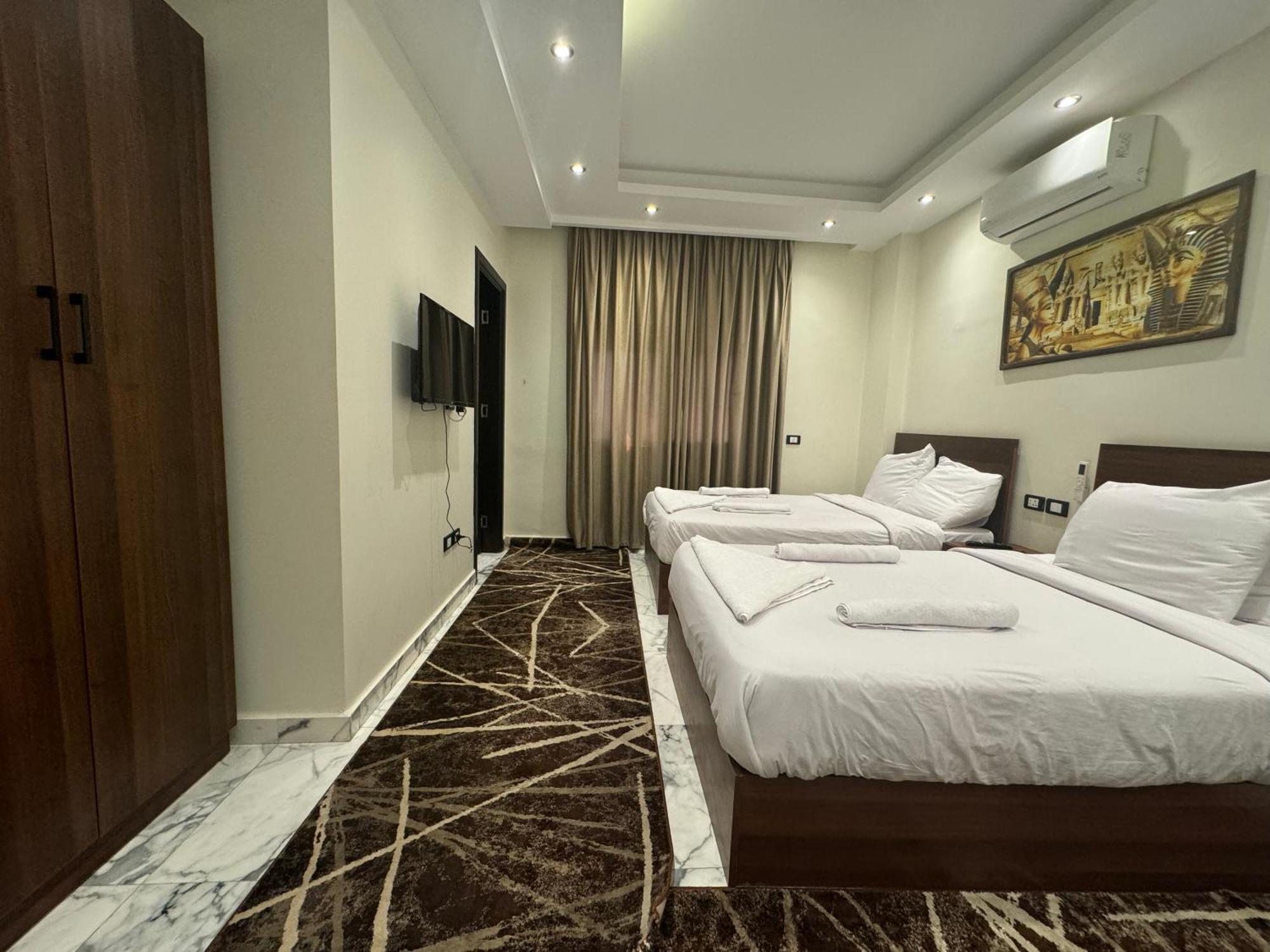 Unique Pyramids Boutique Inn Kafret el-Gabal Exteriör bild