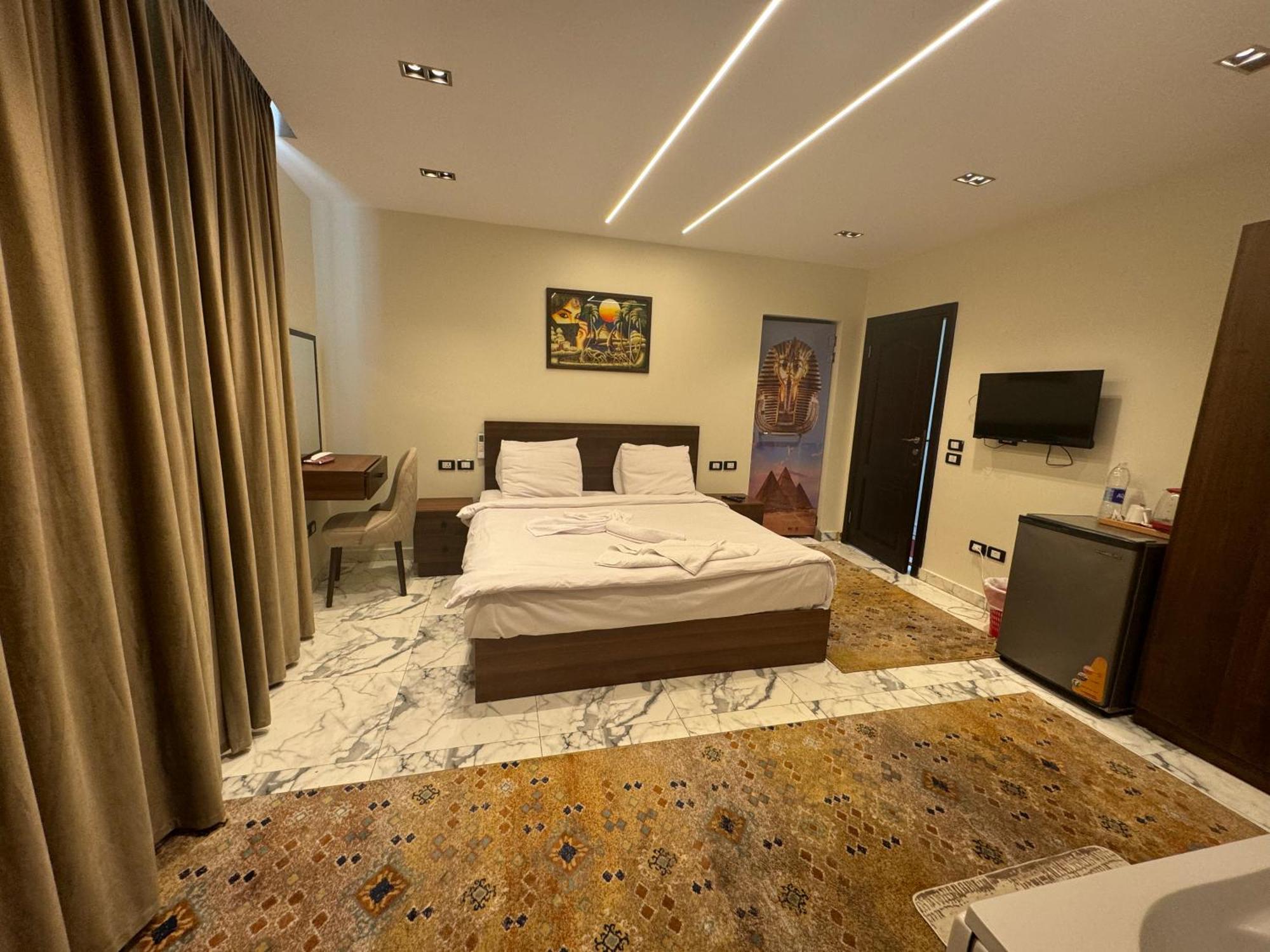 Unique Pyramids Boutique Inn Kafret el-Gabal Exteriör bild